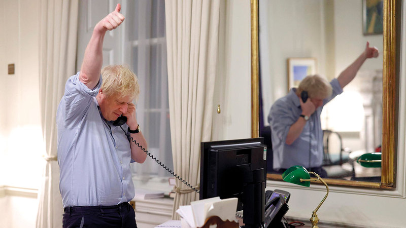 جونسون يحاول التركيز على نقاط الاتفاق مع بايدن.  أرشيفية