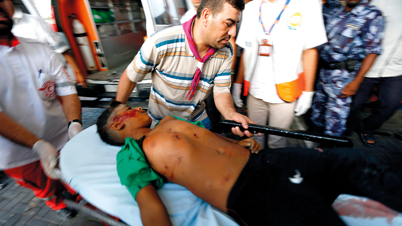 سيد بكر أحد من أصيبوا بجروح في الهجوم على أطفال عائلة بكر على شاطئ غزة عام 2014.    أ.ف.ب