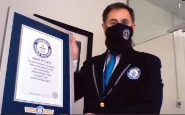 الصورة: القرية العالمية تحقق رقمها القياسي الـ 16.. &laquo;لقد تلقيت التطعيم&raquo;