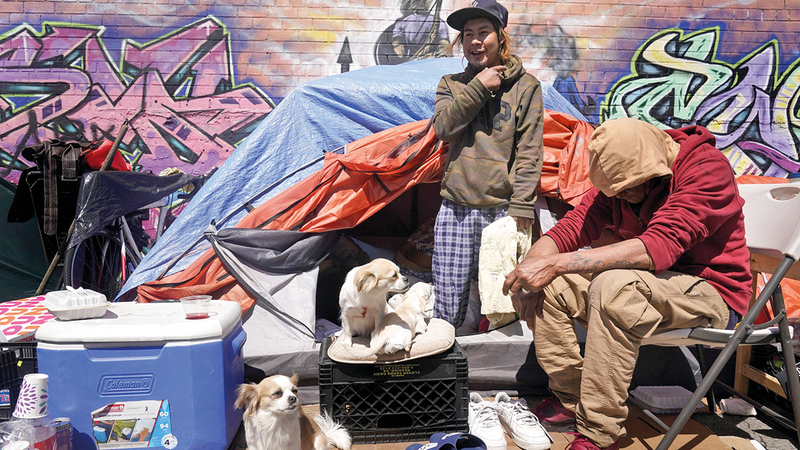 لجأ العديد من المهاجرين إلى الخيام بعد أن ضاقت بهم الأرض. 		 أرشيفية