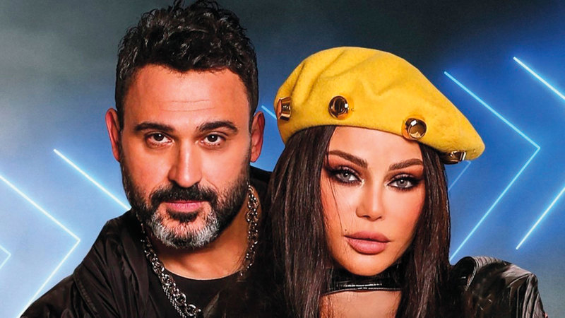 أكرم حسني في كليب «لو كنت» مع هيفاء وهبة.   أرشيفية