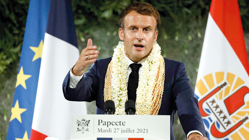 ماكرون: ضحايا التجارب النووية يجب أن يحصلوا على تعويضات أكبر.  أ.ف.ب