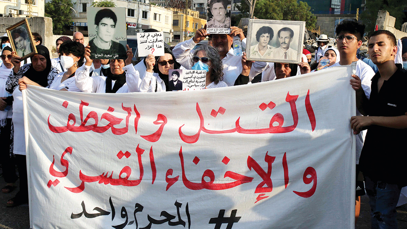 مسيرة احتجاجية ضد الأوضاع الحياتية في الذكرى السنوية الأولى لتفجير مرفأ بيروت.  إي.بي.إيه