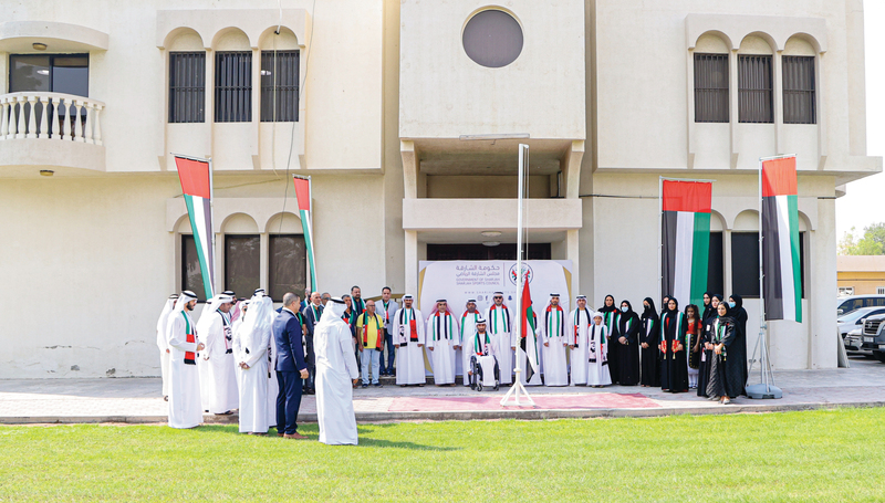 خلال رفع العلم في مجلس الشارقة الرياضي.   من المصدر