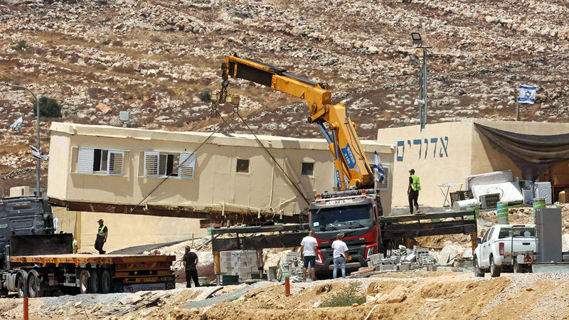 جانب من أعمال إقامة الحي الاستيطاني الجديد.   الإمارات اليوم