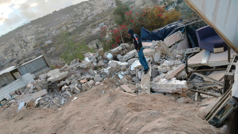 ركام منازل عائلة نصار.   الإمارات اليوم