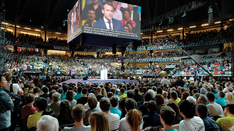 الحملة الانتخابية الأولى التي أوصلت ماكرون إلى السلطة.   أ.ف.ب