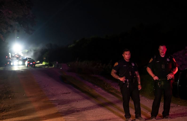 وأشار مسعفون إلى أن الجثث كانت مكدسة فوق بعضها البعض داخل المقطورة.