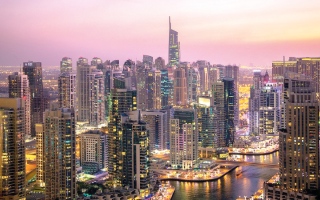 الصورة: هل يخضع شراء وبيع العقارات والأراضي في الإمارات لضريبة الشركات؟
