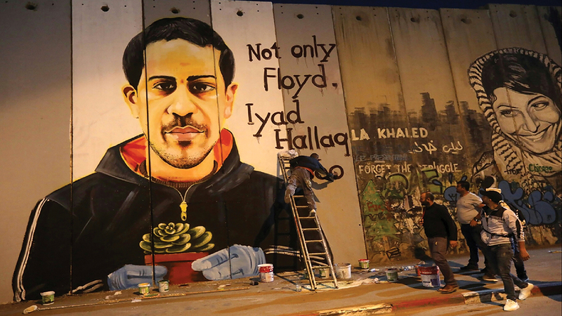 جدارية الشاب الشهيد إياد الحلاق. الإمارات اليوم