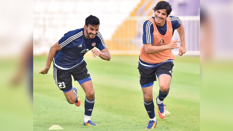 خالد العطاس مع شقيقه أحمد خلال مشاركتهما في الأولمبي. من المصدر