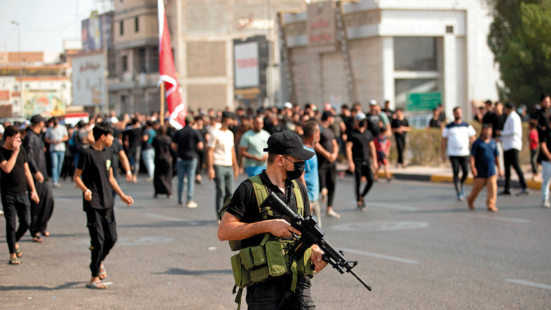 المظاهر المسلحة في الشارع العراقي خلال الأحداث الأخيرة. أ.ف.ب