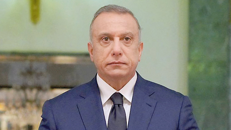 الكاظمي أثنى على سياسة ضبط النفس التي أظهرها الصدر. أ.ف.ب