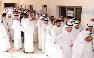 الصورة: الكويتيون ينتخبون أعضاء مجلس الأمة 2022