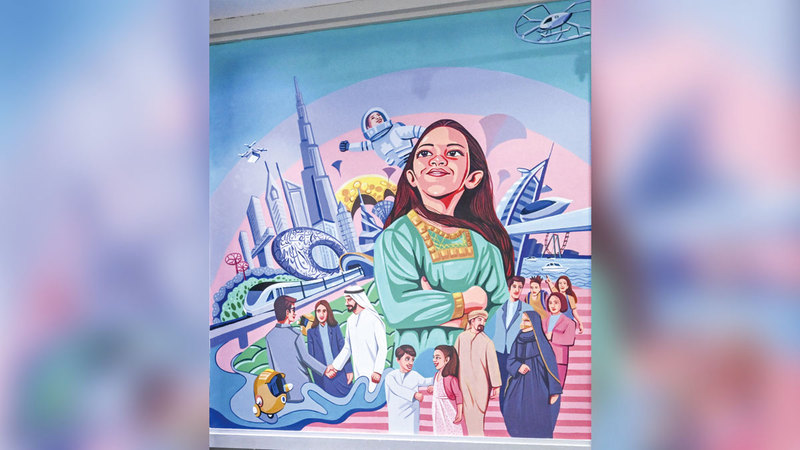 الجدارية الفائزة تتلون بملامح النهضة العمرانية دون أن تغيب الوجوه. تصوير: أشوك فيرما