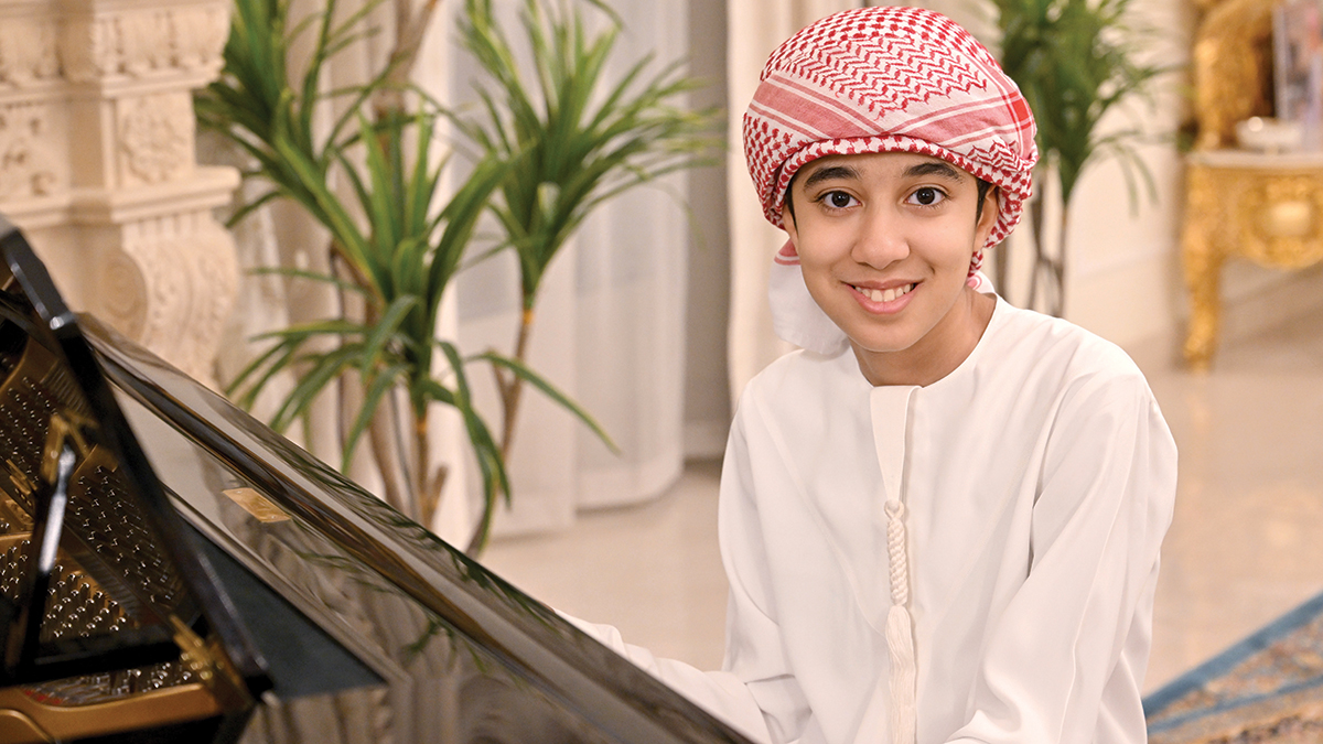 أحمد الموسوي 12 عاماً لديه موهبة موسيقية استثنائية. تصوير: إريك أرازاس