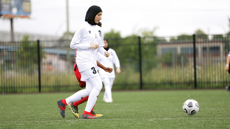 من تدريبات الخوري مع منتخب الأولمبياد الخاص لكرة القدم للسيدات استعداداً لدورة برلين العالمية. من المصدر