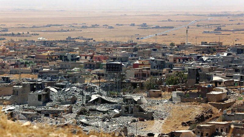 مشهد عام لسنجار يظهر حجم الدمار الذي لحق بها نتيجة هجوم تنظيم &laquo;داعش&raquo; الإرهابي عليها.  أرشيفية