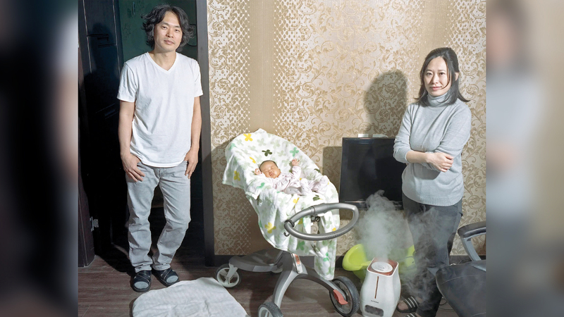 زوجان كوريان تبنتهما عائلة أميركية عادا ليعيشا في مسقط رأسهما. أرشيفية