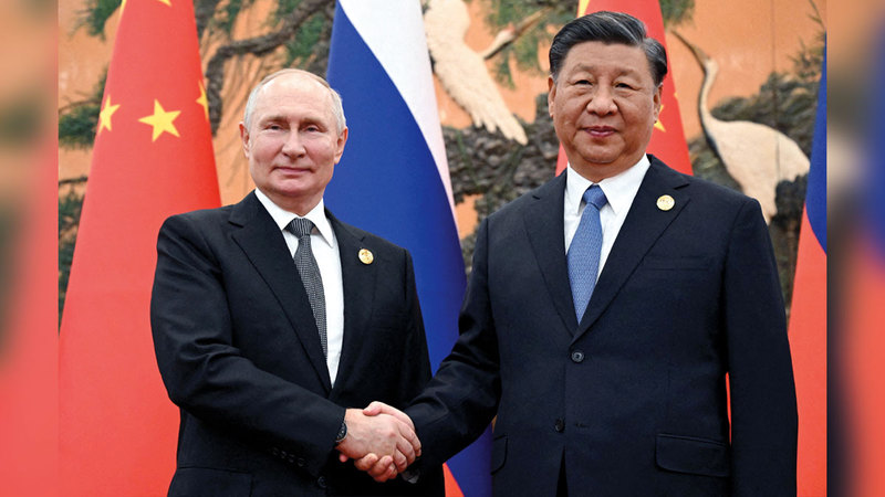 الرئيس الصيني يرحب ببوتين الذي كان ضيف شرف على القمة. رويترز