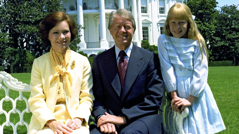 الزوجان الرئاسيان مع ابنتهما إيمي في البيت الأبيض. أرشيفية