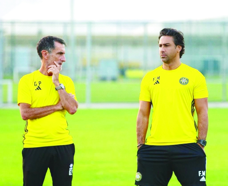 مدرب كلباء فرهاد مجيدي. من المصدر