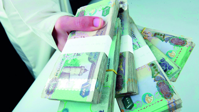 خصم المتأخرات من الحسابات الأخرى ينطبق على حسابات الأفراد والشركات. أرشيفية