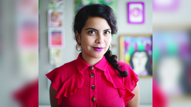 الصحافية ورسامة الكاريكاتير والروائية المصورة ملكة غريب.  من المصدر