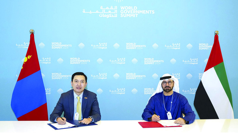 القرقاوي أثناء توقيع الشراكة مع  منغوليا. من المصدر