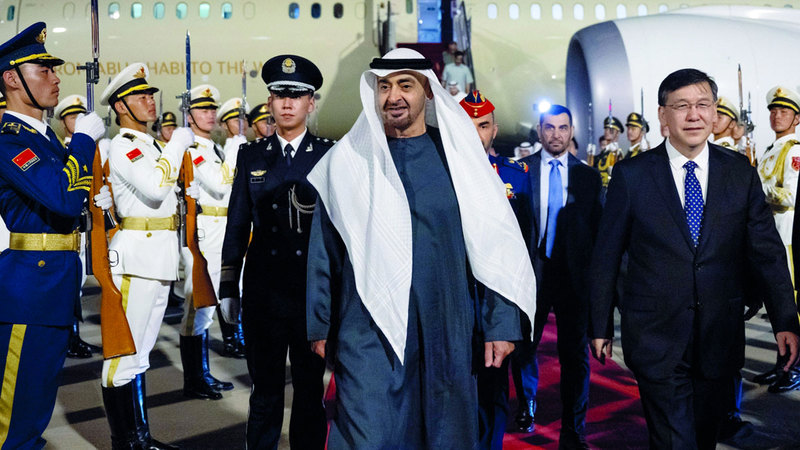 رئيس الدولة لدى وصوله إلى بكين. وام