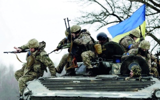 الصورة: الكرملين يخوض حرباً شاملة في أوكرانيا ستغير الاقتصاد الروسي