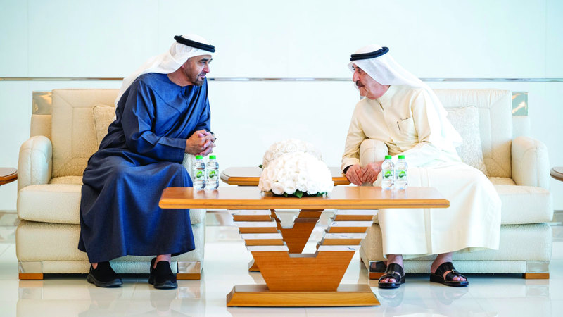 رئيس الدولة خلال تقديمه واجب العزاء إلى حاكم أم القيوين. وام