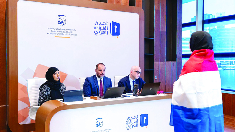 لجنة التحكيم خلال التصفيات النهائية للجاليات في تحدي القراءة العربي. من المصدر