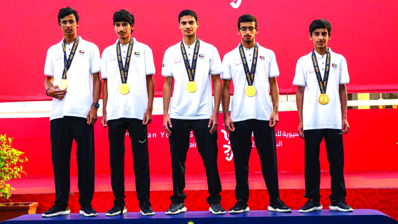 أبطال الإمارات على منصة التتويج في دورة الألعاب الآسيوية للشباب. وام