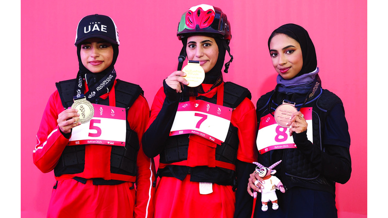 أبطال الإمارات على منصة التتويج في دورة الألعاب الآسيوية للشباب. وام