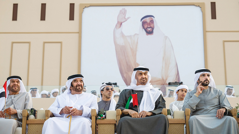 رئيس الدولة خلال حضوره «مسيرة الاتحاد» بمنطقة الوثبة في أبوظبي. وام