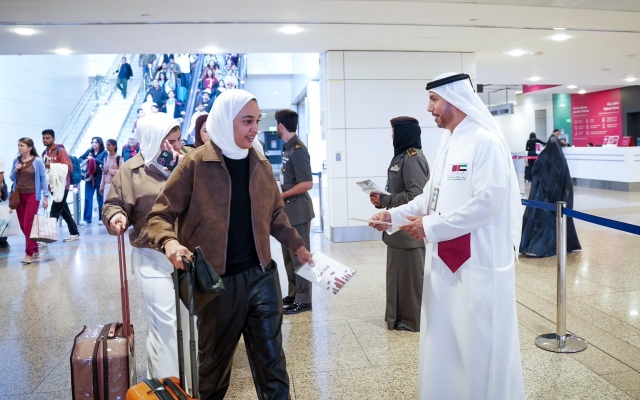 الصورة: دبي تستقبل زوارها بختم &ldquo;الإمارات &ndash; قطر كل عام وأنتم بخير&rdquo;