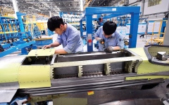 الصورة: رفع سن التقاعد في الصين يزيد الضغوط على العمال الأصغر سناً