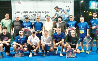 الصورة: بالأب والابن.. &laquo;أهلي&raquo; بطل البادل في &laquo;بلدية دبي&raquo;