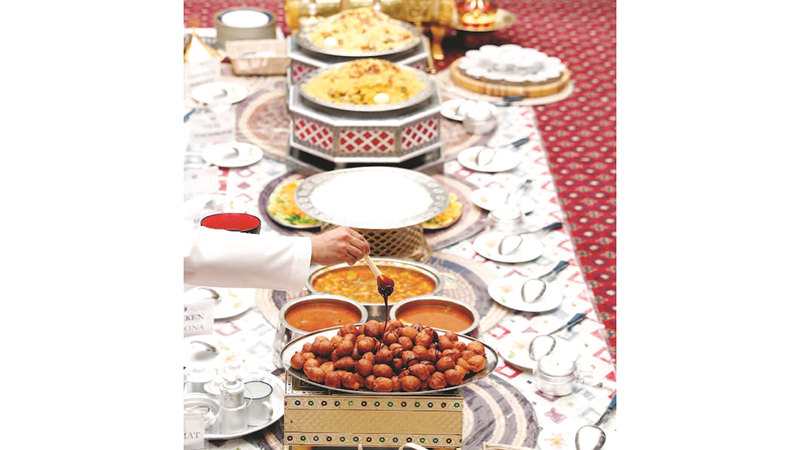 اللقيمات لا تغيب عن مائدة عادل إبراهيم الرمضانية. أرشيفية