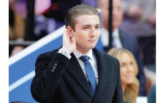 الصورة: حاكم ولاية مينيسوتا السابق يطالب بانضمام بارون ترامب إلى الجيش