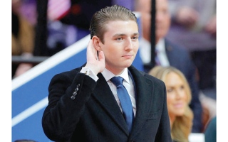 الصورة: حاكم ولاية مينيسوتا السابق يطالب بانضمام بارون ترامب إلى الجيش