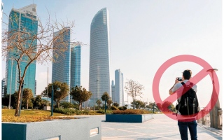 شرطة أبوظبي تضبط 375 شخصاً بتهم تصوير مواقع مختلفة ذات صلة بالأحداث الراهنة