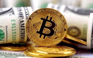 الصورة: استقرار الدولار وارتفاع بتكوين