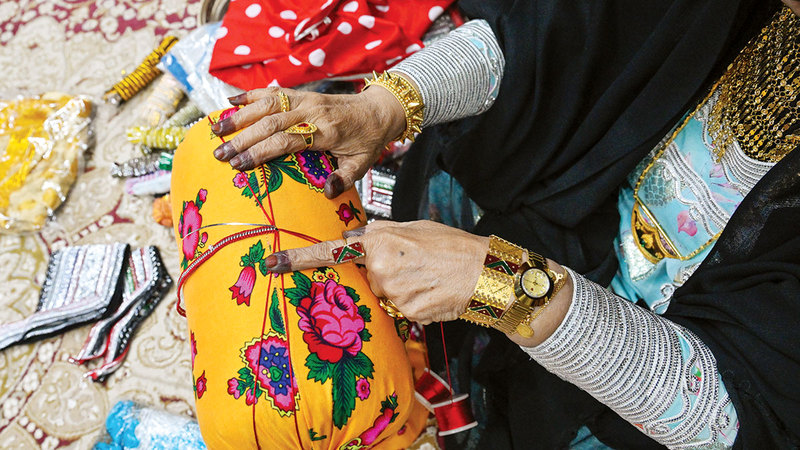 &laquo;أم غانم&raquo; أكدت أن &laquo;التلي&raquo; ليست مجرد مهنة بل إرث وطني يعكس الهوية. تصوير: أشوك فيرما