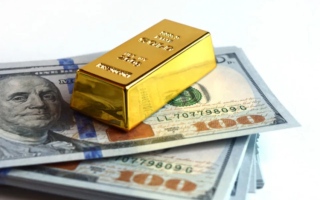 الصورة: استقرار أسعار الذهب والدولار وارتفاع العملات المشفرة