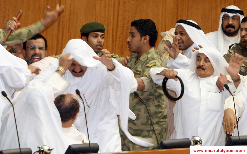 رئيس المجلس، جاسم الخرافي، الذي كان متغيباً عن الجلسة، وصف العراك بأنه "معيب"-أ.ف.ب