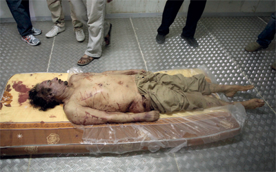 جثة العقيد وضعت لكي يعرف الكل أن القذافي مات.	أ.ب
