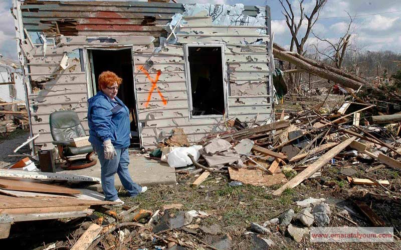 جانيت كلارك نجت من الأعاصير بعد أن اختبأت في حمام بيتها. رويترز