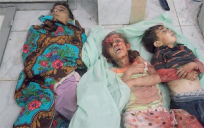 أطفال ضحايا مجزرة القبير الجديدة في سورية.	 أ.ف.ب